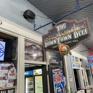 a sign for the downtown deli