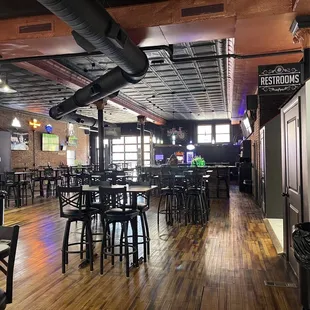 an empty restaurant with tables and chairs
