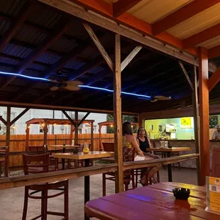 a woman sitting at a table