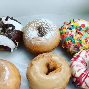 S'mores, French toast, strawberry cheesecake, and I can't remember the name of the fruity pebbles. Plus 2 glazed!