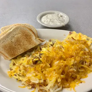 Southern scramble with toast and a side of country gravy.