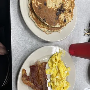Lumberjack Jr with scrambled eggs, bacon, and chocolate chip pancakes