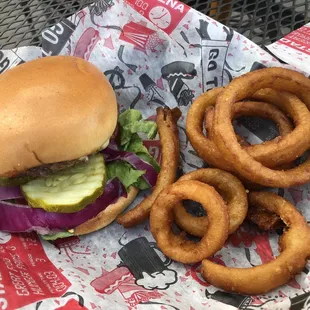 Single burger with choice of cheese &amp; toppings with a side of onion rings