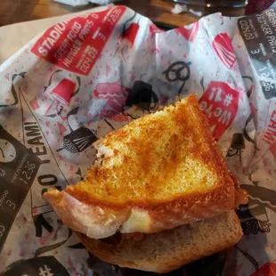 Half of the peanut butter bacon burger