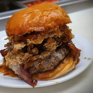 a burger on a white plate