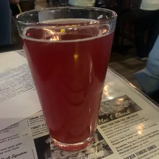 a drink in a glass on a table
