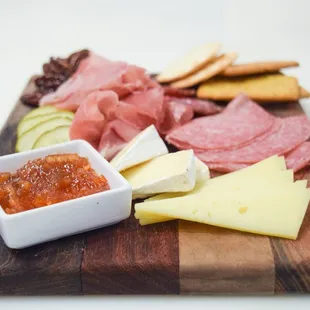 a platter of meat and cheese