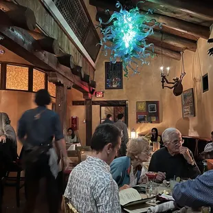 a group of people sitting at a table