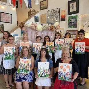 All of the girls who attended the bridal shower with the paintings we did.