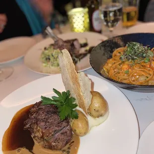 Filet mignon, pork chop and prawn pasta.