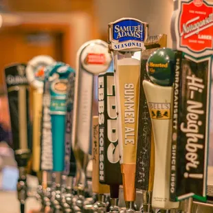 a row of beer taps