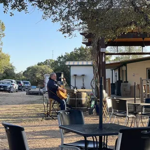 a man playing a guitar