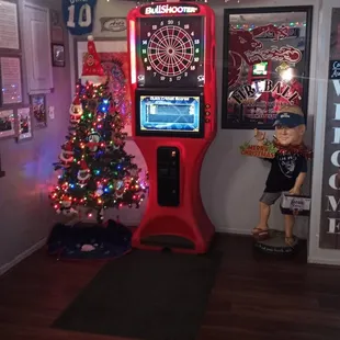 a christmas tree in the corner of the room