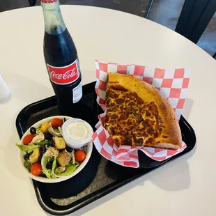 12.00 lunch special slice of pizza (1/4 of a pizza), small salad, and a pop!