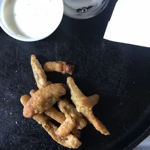 After I took out the fried onion in the bag this was all of the jalapeño that I got... 4 bucks.