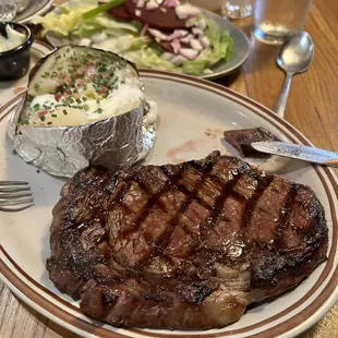 Ribeye14 oz- unfortunately no smaller- take some home with you. Delish potatoe with the steak.