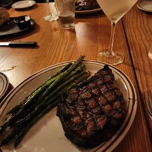 Whiskey marinated prime rib with asparagus and martini.