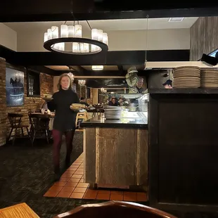 Our server passing by the salad bar.