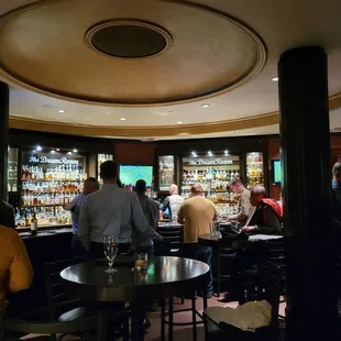 people sitting at the bar