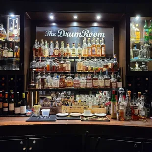 a bar with liquor bottles