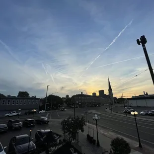 the sun setting over the city