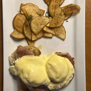 Eggs Benedict with choice of Irish rashers, corned beef, sausage, ham, or bacon