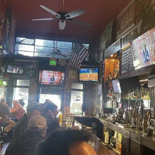 people sitting at the bar