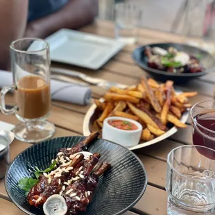 a plate of food on a wooden table