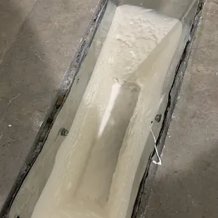 In-floor duct after clean and coated.