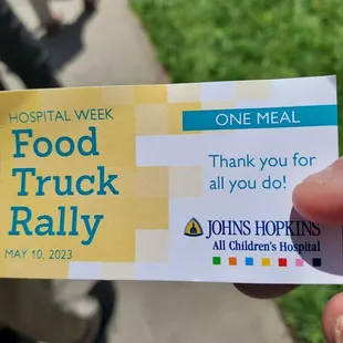 a person holding a ticket