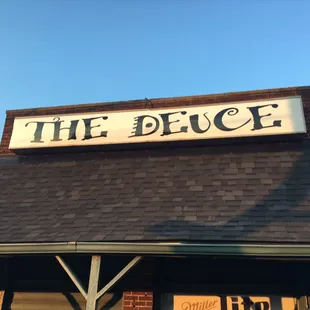 a sign on the roof of a restaurant