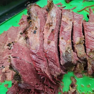 sliced beef on a cutting board