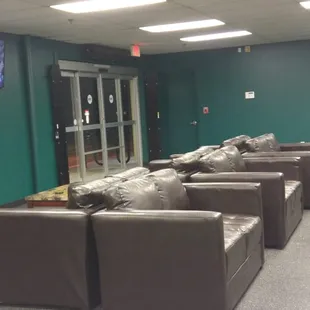 Comfortable seating in the waiting area with WiFi and Cable sports channel!