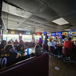 Sports bar with Fans watching all the games