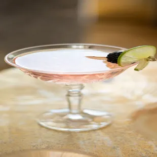 a cocktail in a coupe glass