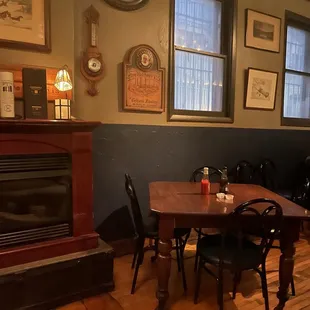 a dinning room with a fireplace