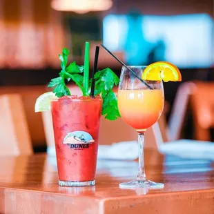 two cocktails on a table