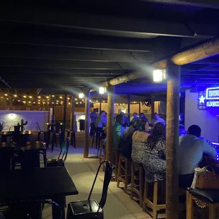 people sitting at the bar