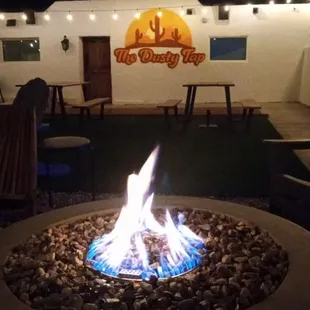 We&apos;ve got a fire pit to cozy up next to along with a heated patio for cooler weather