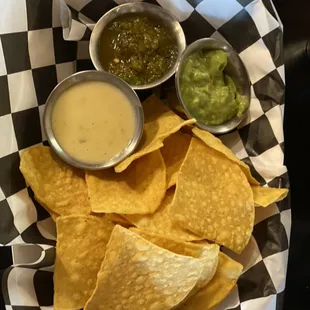 The Three Amigos is the perfect snack! Fresh tostadas made in house and everyone&apos;s favorite trio guacamole, salsa and queso for dipping.