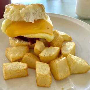 Bacon, egg, &amp; cheese biscuit, with home fries