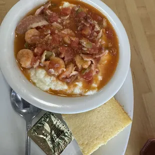 Shrimp and grits. This girl doesn&apos;t do grits but it was good.