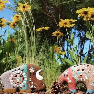 a Navajo, hand made, sand painted Buffalo and Bear