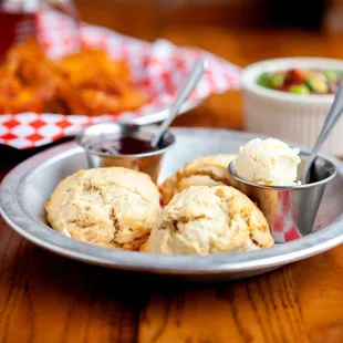 a plate of biscuits and a bowl of ice cream
