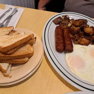 two plates of breakfast food