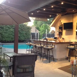 Outdoor Kitchen and large beam patio structure