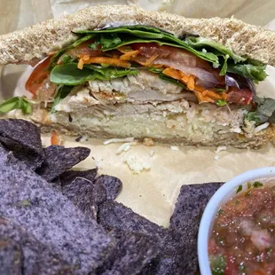 Turkey sandwich and side of chips and salsa