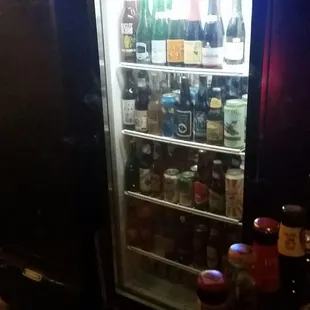 Lotta imports including Japanese rice beer.