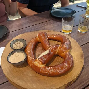 Delicious pretzel with dips