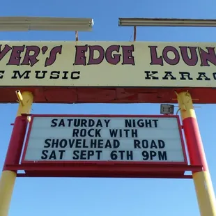 the sign for the bar and lounge